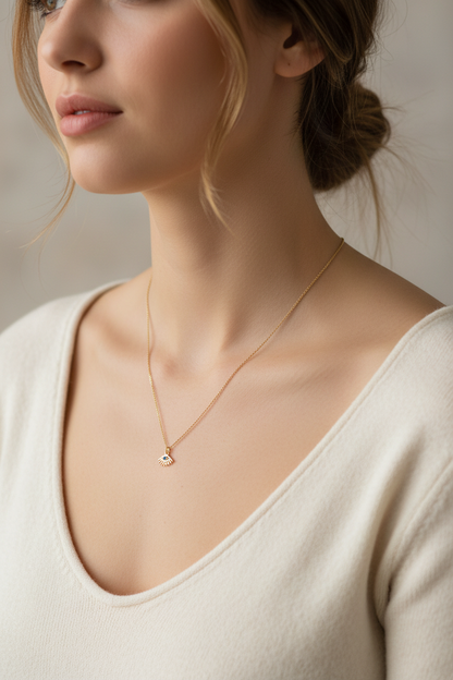 Lifestyle shot of eye necklace on model